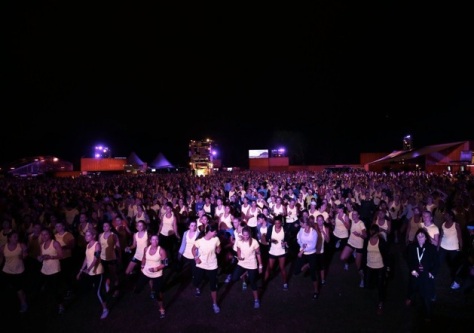6000 Women warming up to take on the night for Nike She Runs 10km Race.jpg